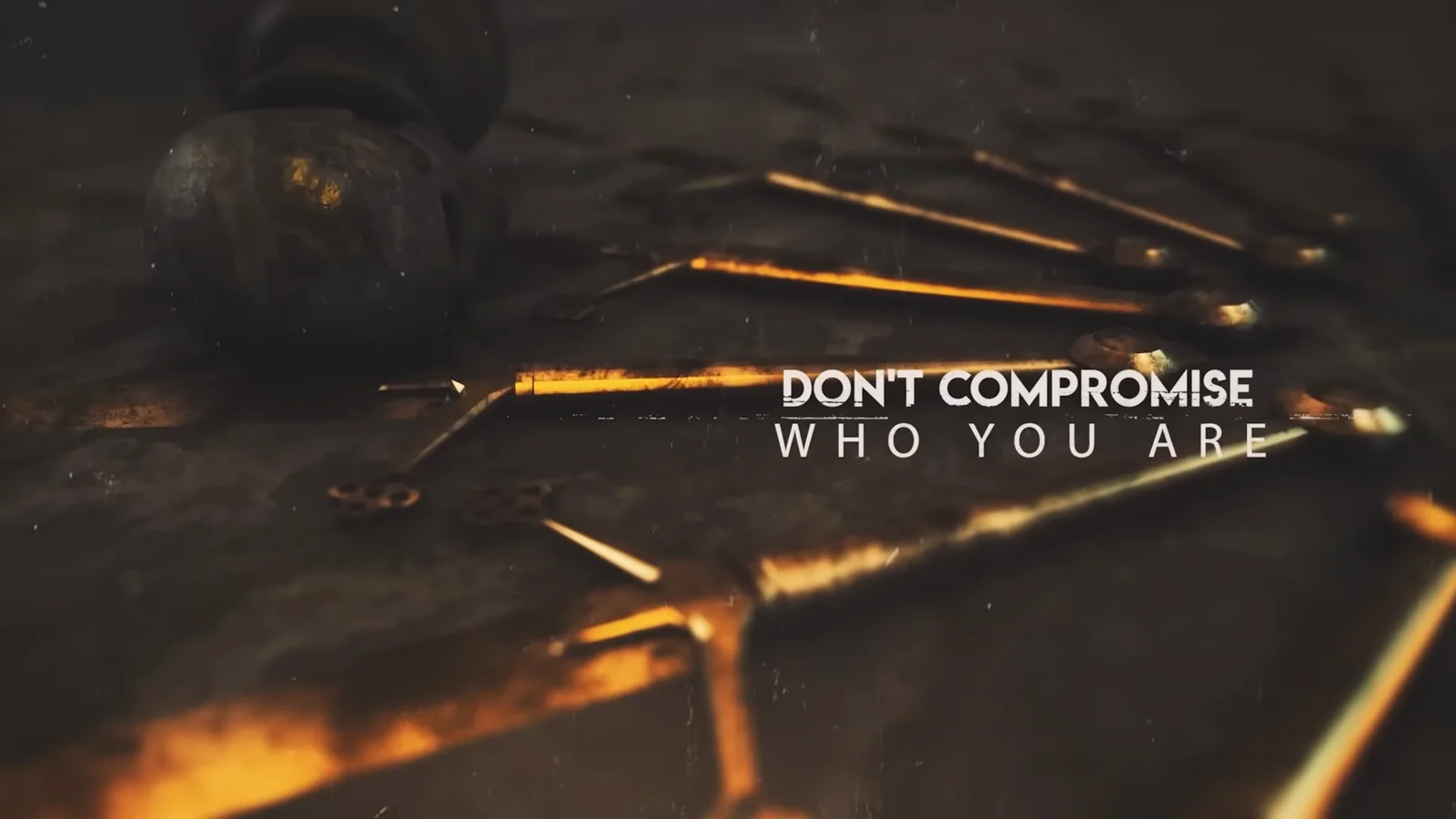 Cinematic amber frame with Don't Compromise Who You Are typography from Alter Bridge's This Is War lyric video